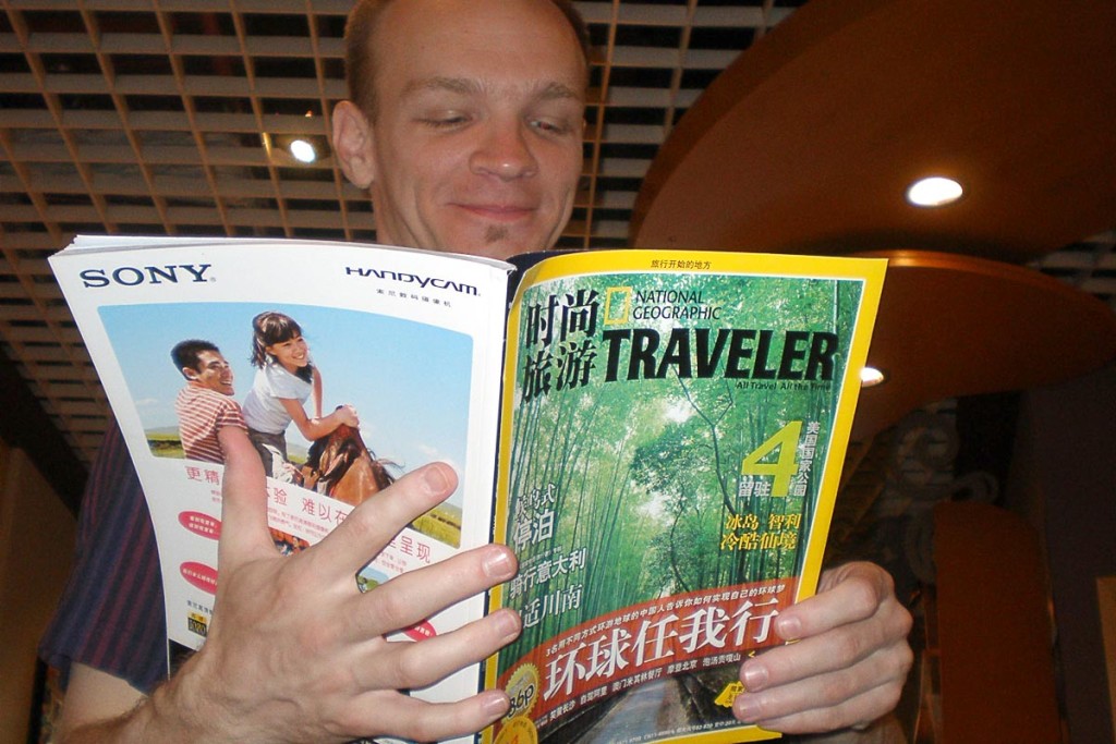 jeremy-reading-traveler-magazine-beijing-airport