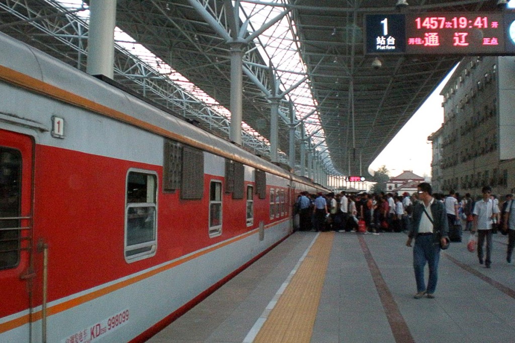 people-crowding-outside-a-train-in-beijing