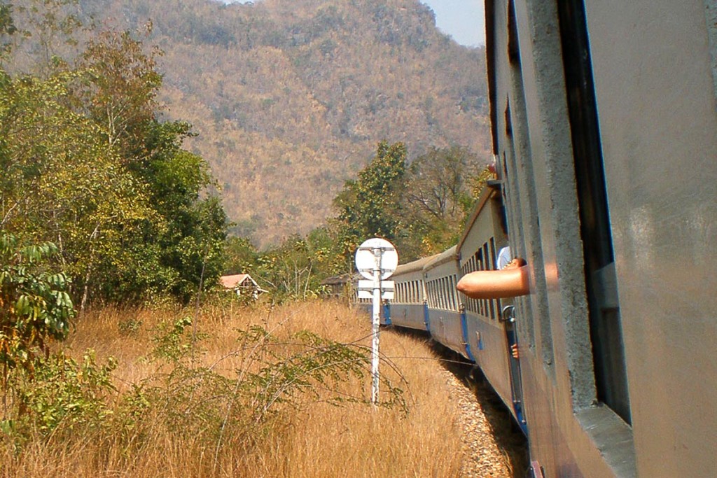 elbow-out-train-window-death-railway-thailand