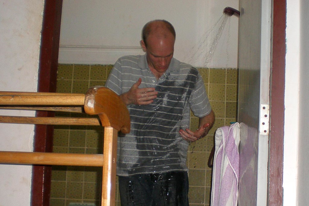 Before the Scrubba, combining laundry and showering made sense. (in Thailand)