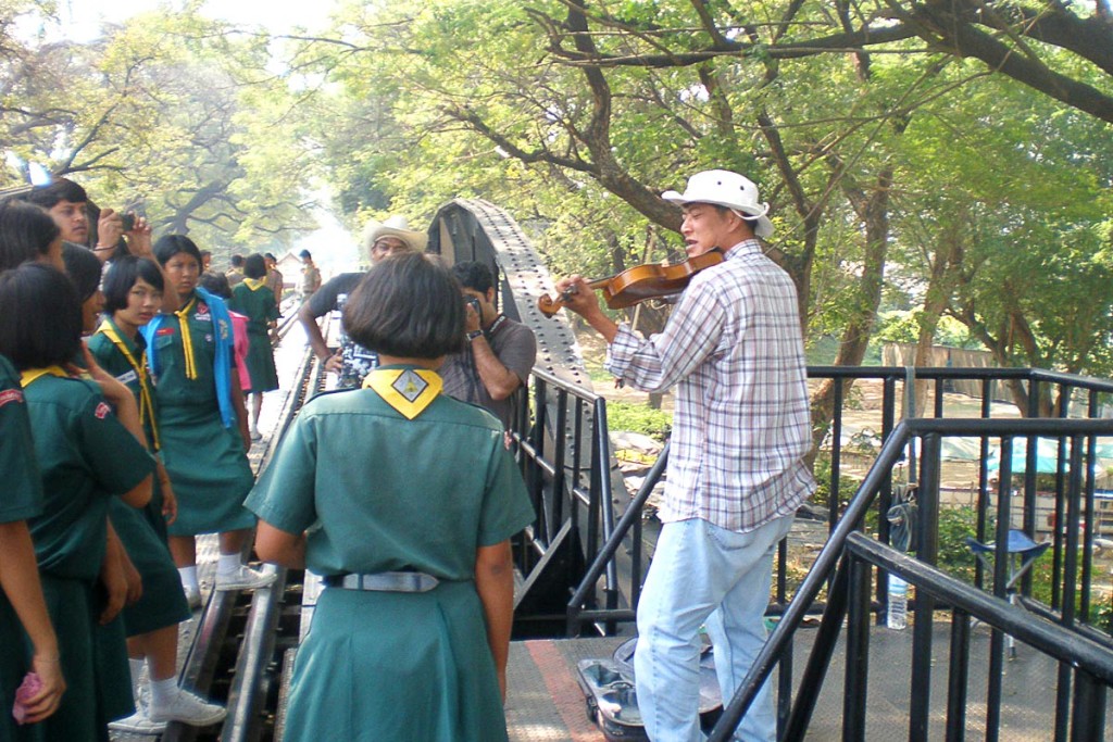 violin-player-bridge-river-kwai-kanchanaburi