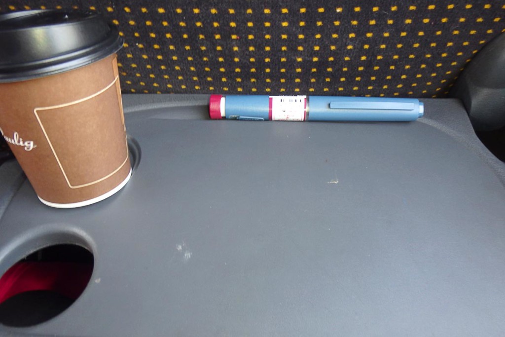 The tray table on the bus came with a dedicated insulin pen groove. At least I assume that's what it was.