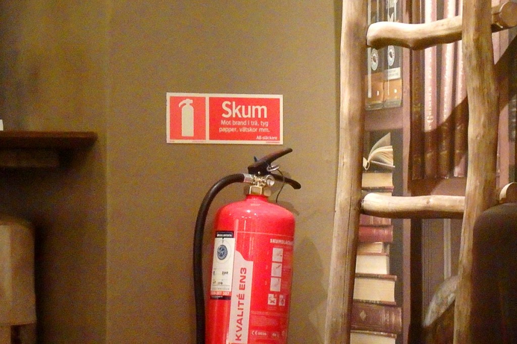 skum-sign-fire-extinguisher-stockholm-cafe
