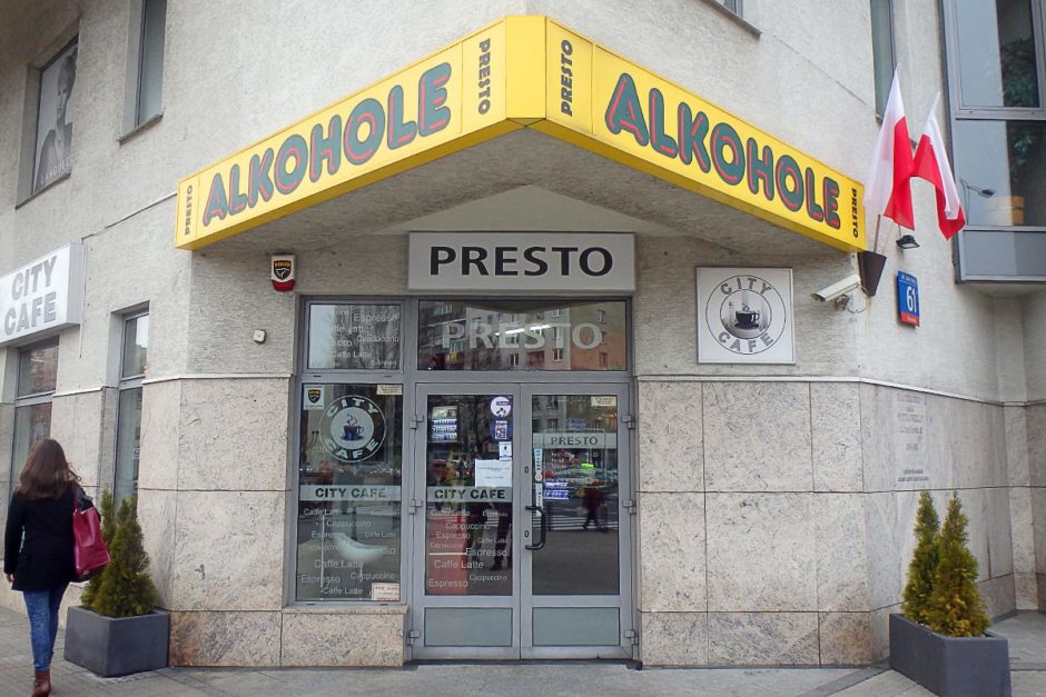 "Alkohole" liquor shop, with a discreet attached cafe with a single table by the window.