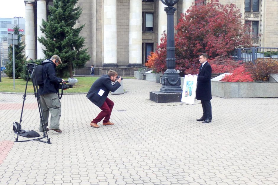 A photo shoot of some kind, in front of the big theater in the Palace of Culture and Science.