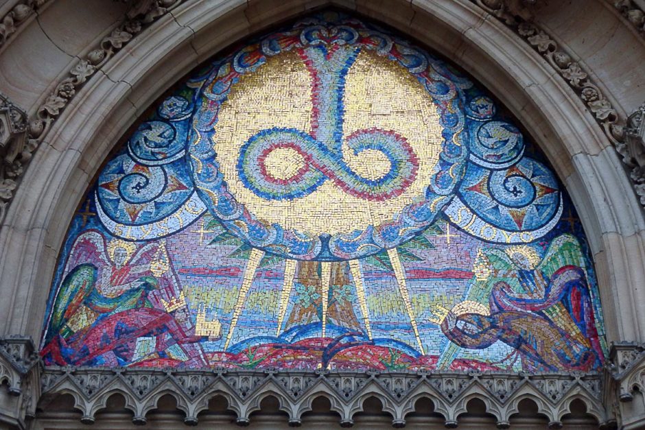 Colorful ornamentations over one of the big doors on the cathedral at Vyšehrad.