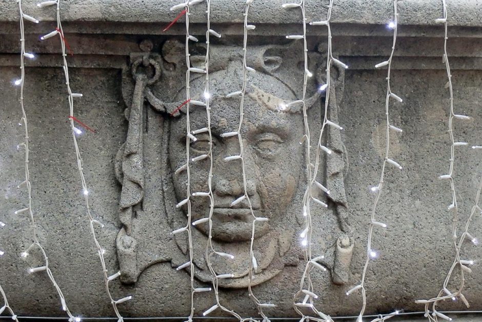 Fountain face with Christmas lights