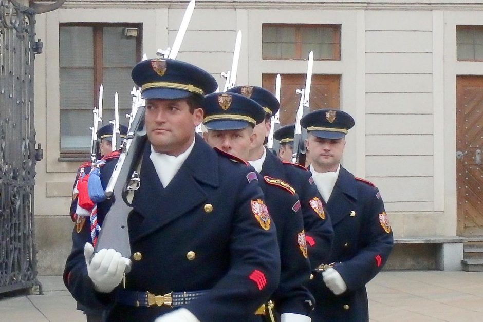 Guards marching past us, scanning the camera-happy tourists like me.