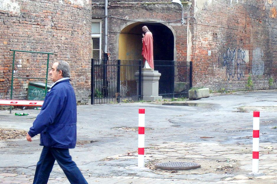 Jesus, quietly doing his thing among some non-descript apartment blocks in Warsaw.