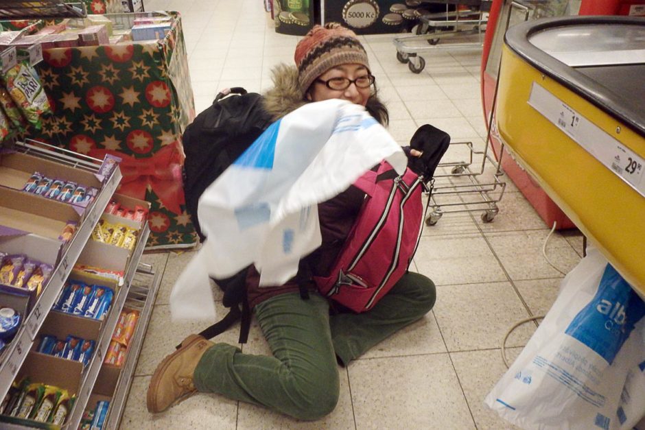 Masayo finally collapsed under the weight of her 1000-kg backpacks. I ran to help her (as soon as I took a picture, that is).