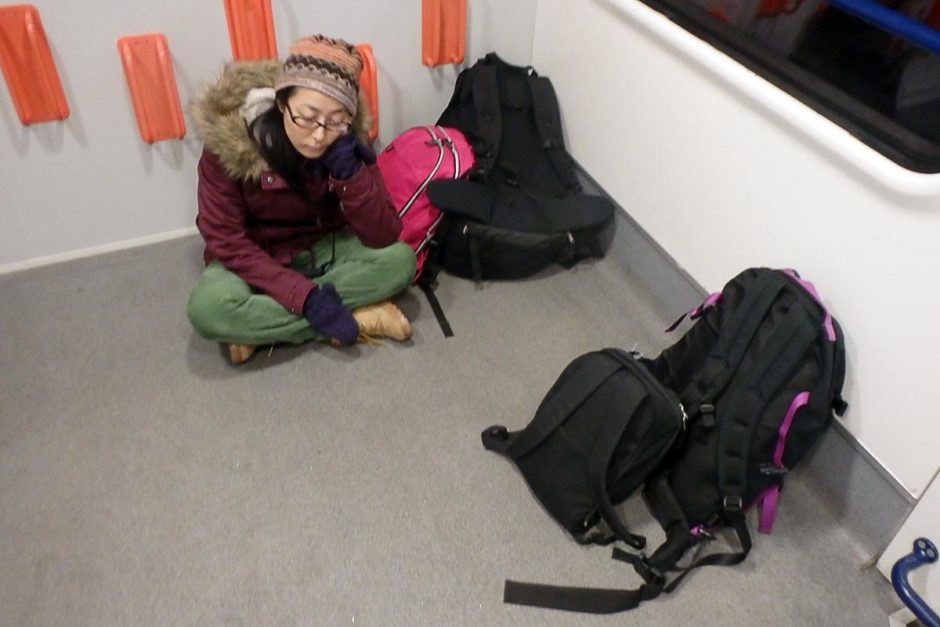 Masayo resting with the bags on the Bratislava train