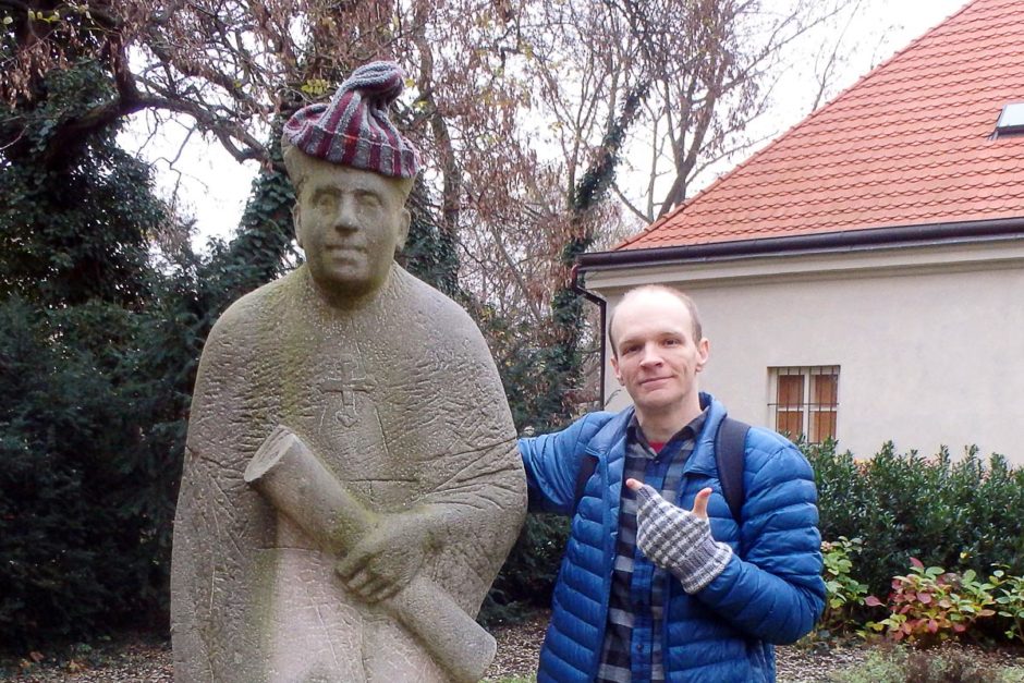 Me with statue and my hat