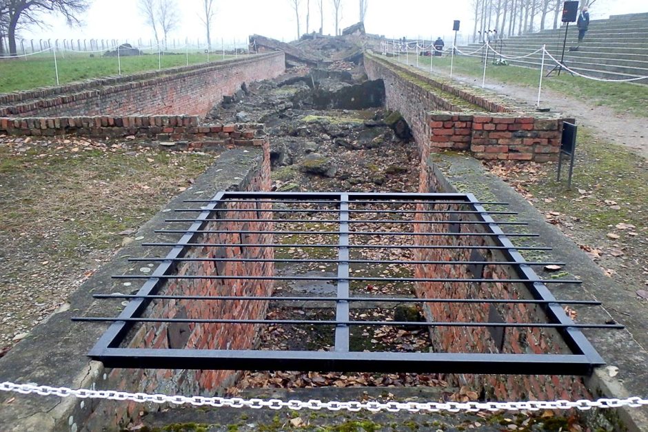 Steps (in the foreground) leading down into one of the crematoria.