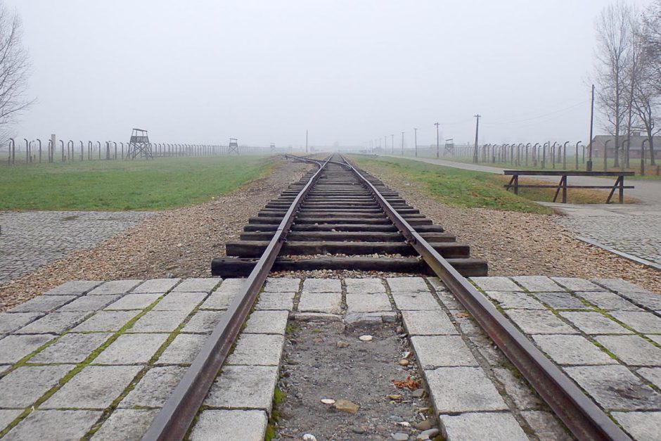 The end of the train tracks, looking back over Birkenau towards the main gate. This is the spot where often unsuspecting prisoners got off the train to be herded into the crematoria and gassed to death.