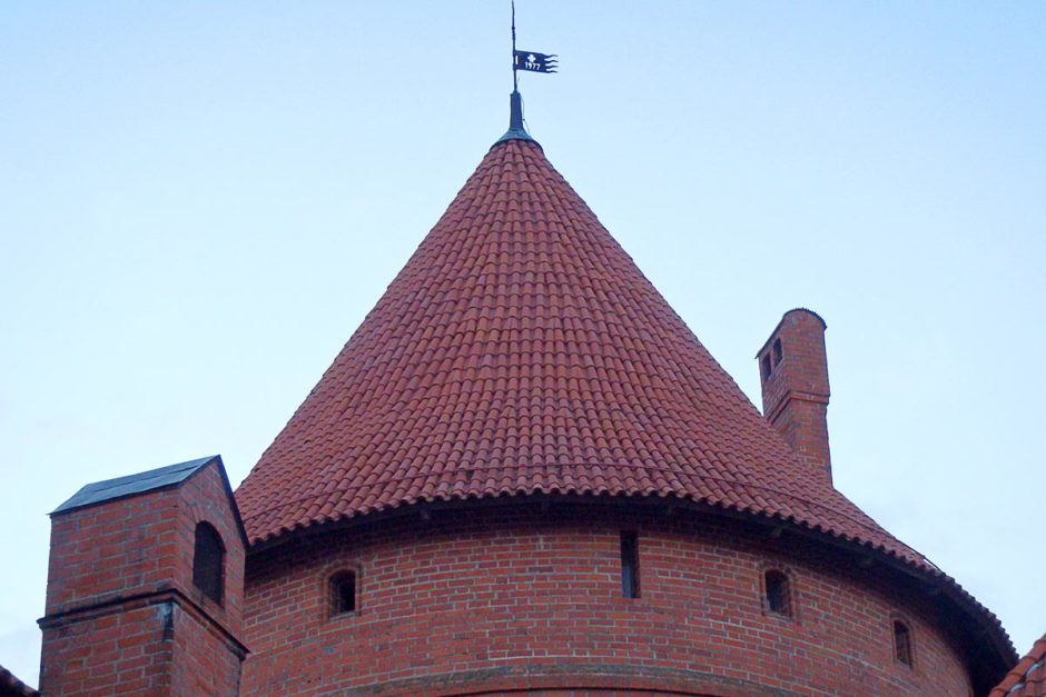 trakai-island-castle-spire-metal-flag-sky