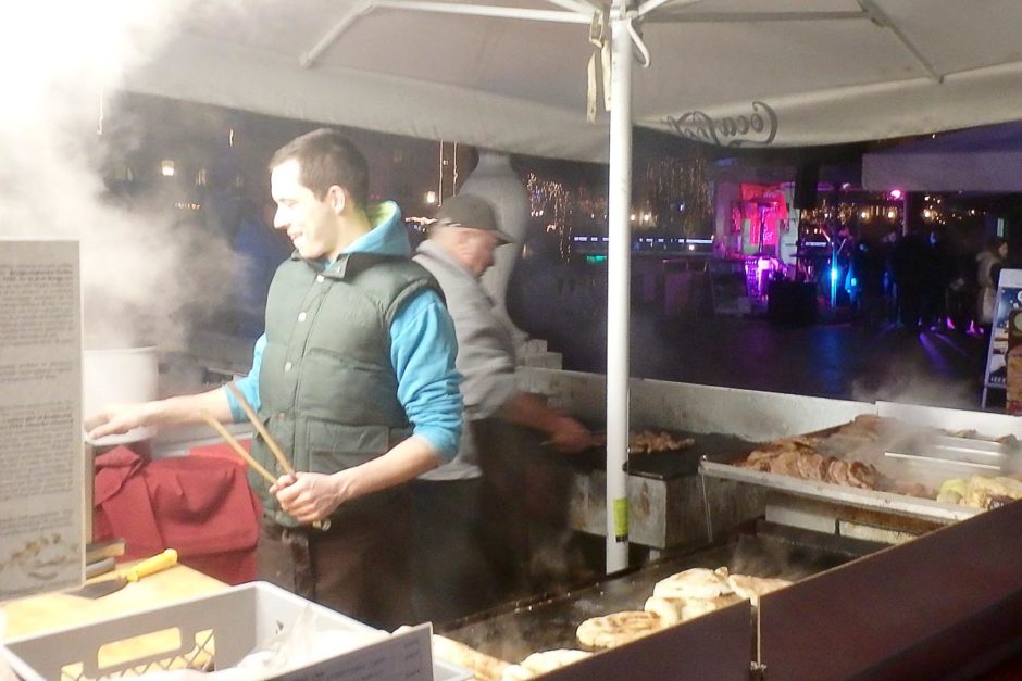 The big hamburgers stall I went to for our dinner. That's our giant buns on the grill.