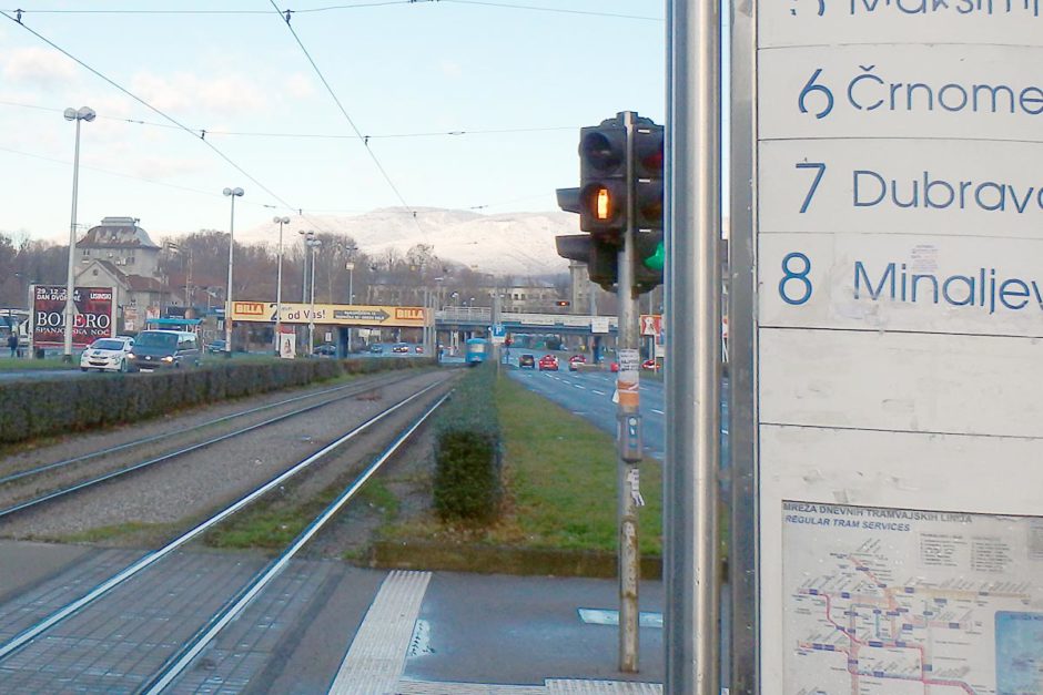 The tram leaving the bus station where we got off, and you can see the snowdust-covered hills in the distance. They weren't like that yesterday.