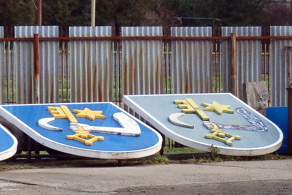 On a back street we passed some industrial-looking place that had half-done coats-of-arms from Humenné sitting out.