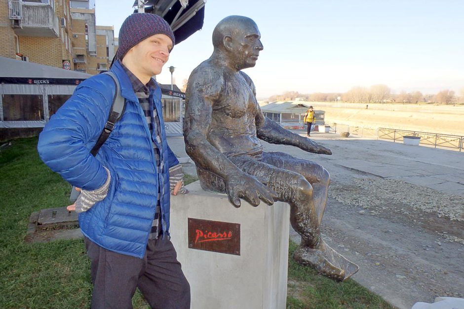 Me and a Picasso statue beside the river.