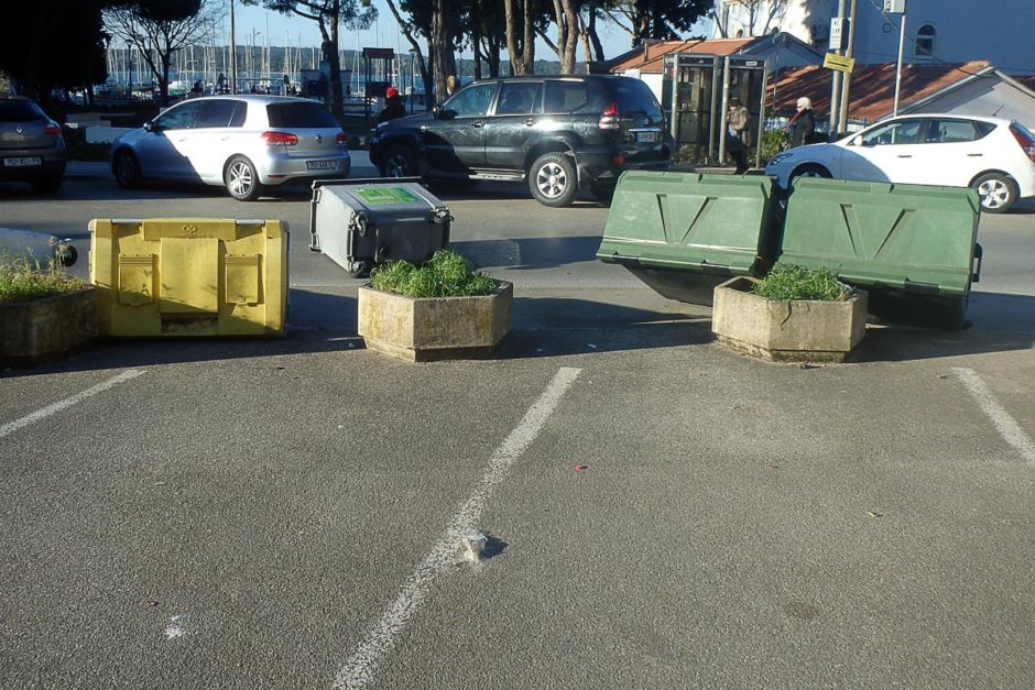 Trash bins littered the roads thanks to the wind. No point in picking them up, they'd just blow over again.