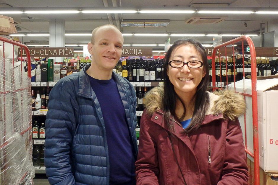 The photo the nice lady took of us. Angry lady not pictured, but suffice it to say that this photo led to a violent international incident, right next to the bakery in the supermarket.