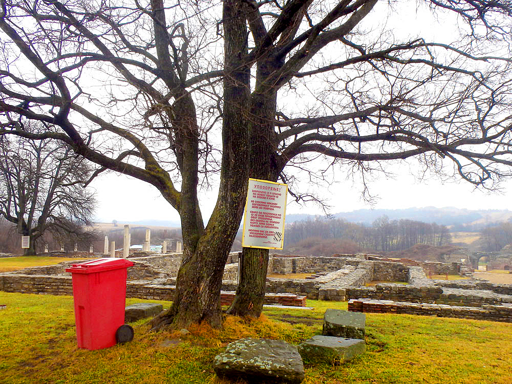 Bare trees and trash can in Felix Romuliana