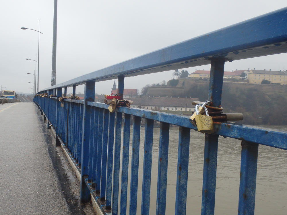 The bridge over the Danube, with padlocks o' love, and the fortress visible in the background.