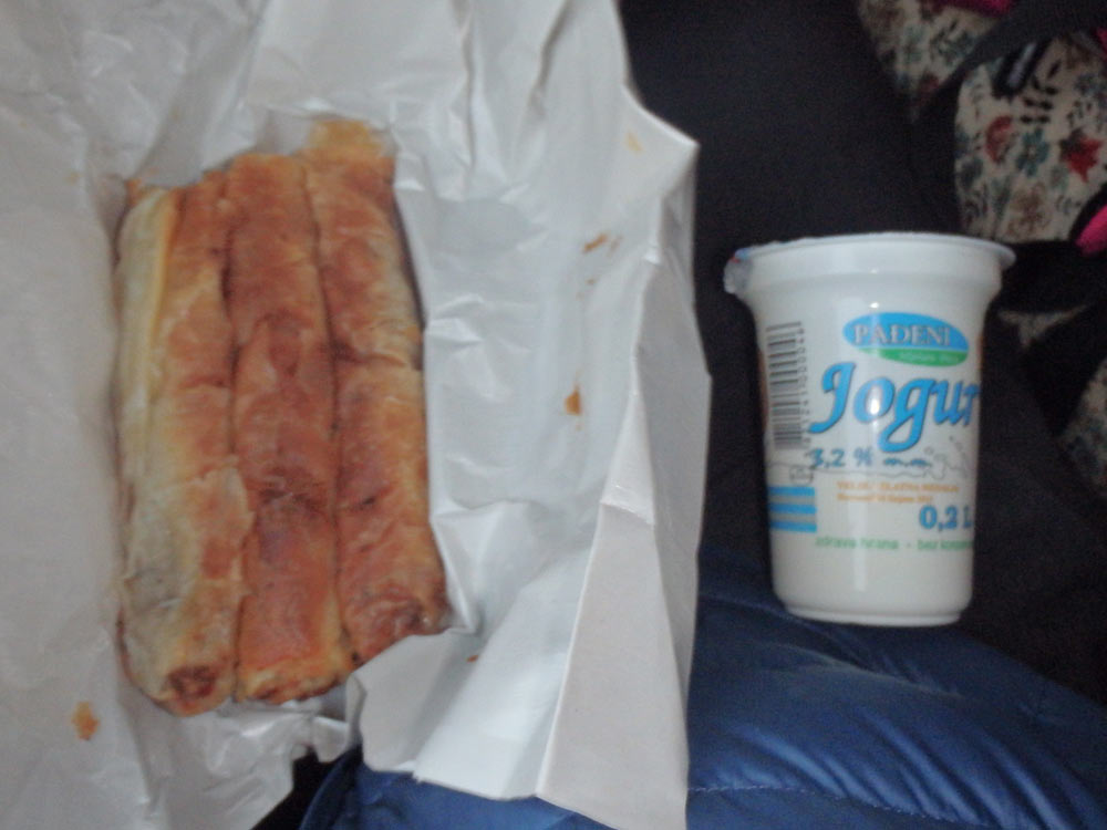 Burek and yogurt snack on the bus