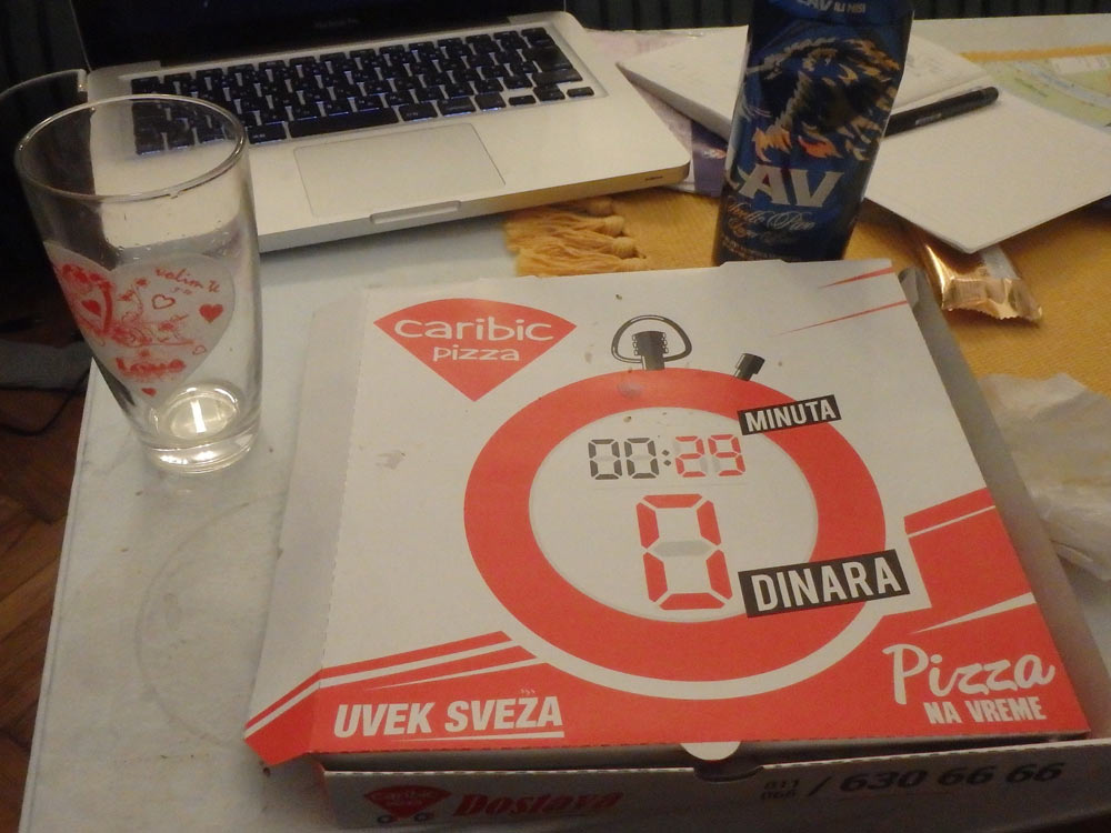 Caribic pizza box and a Lav beer for dinner.