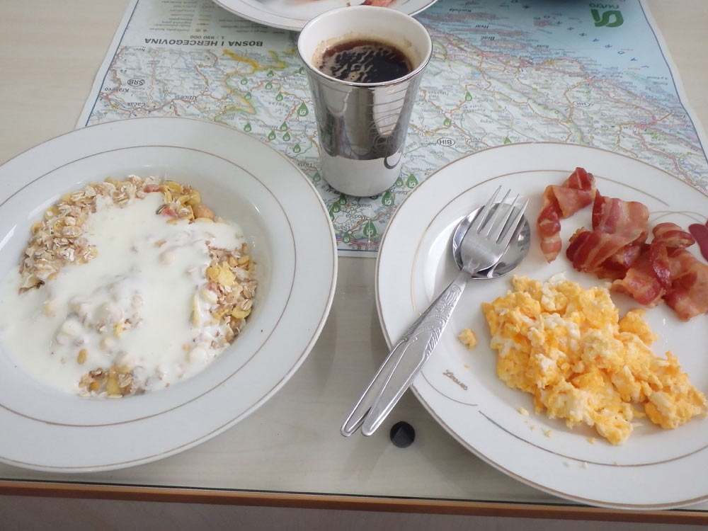 Cereal and eggs and bacon breakfast