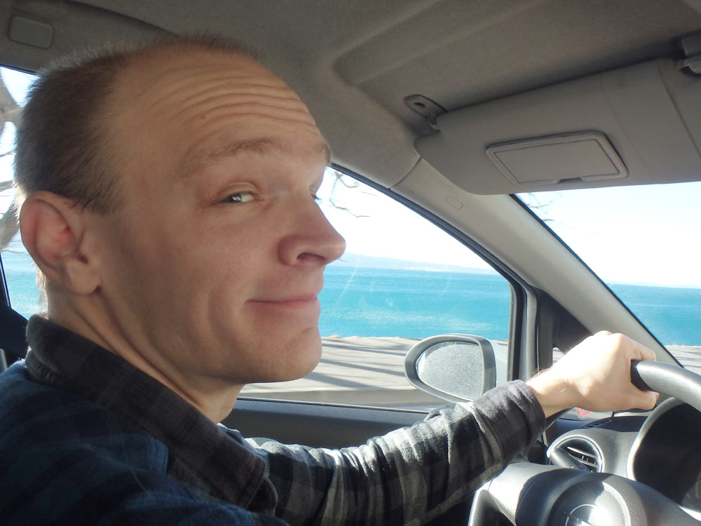 Me driving along the coast, my first time driving in Europe.
