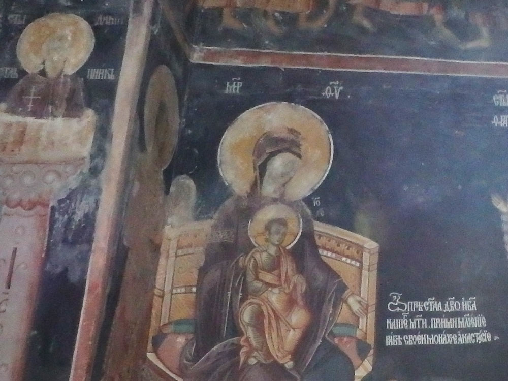 Fresco in Studenica Monastery. This one is probably being restored, but since the face was scratched out by the Turks when they took over the area, its details are not known so it is not restored.