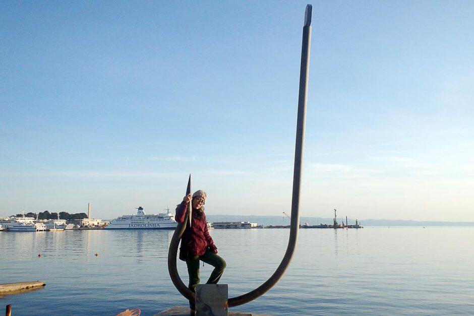 Masayo and a monument to the first mention of fishing in Croatia, from a document 1,000 years earlier.