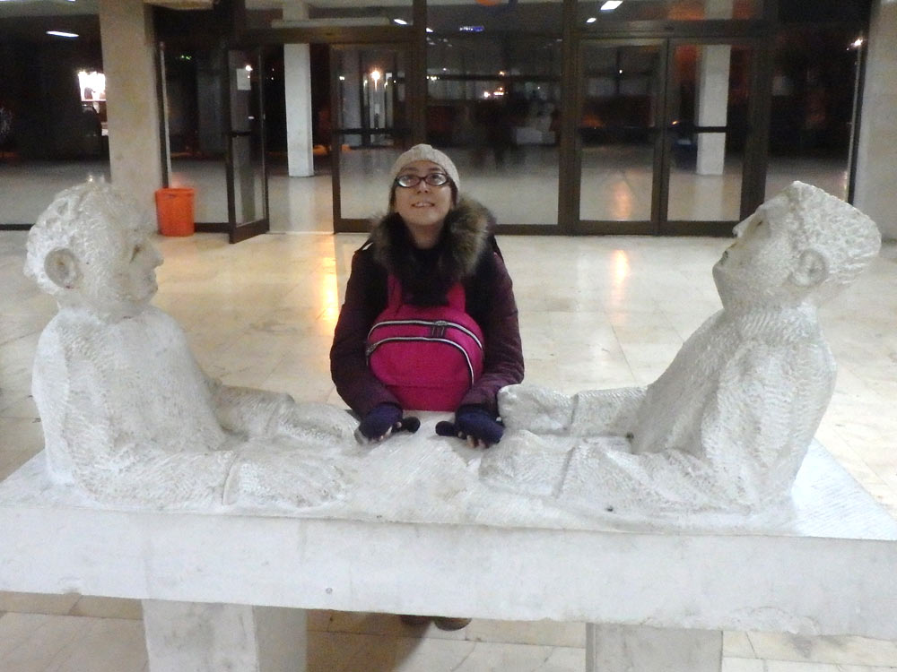 Masayo and plaster figures in Mostar train station