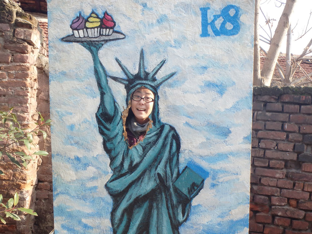 Masayo as The Statue of Liberty, in an alley in Skopje's Old Bazaar