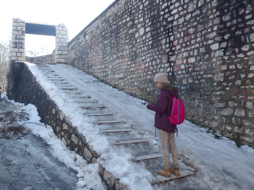 Masayo walking up the icy Sarajevo steps