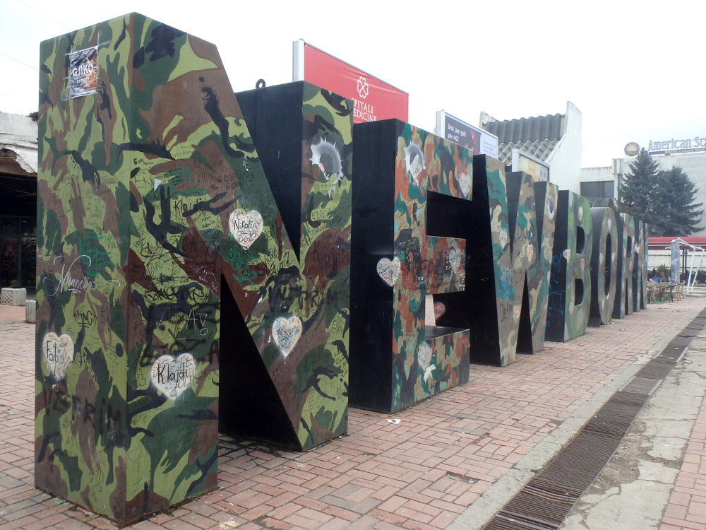 "Newborn" monument celebrating independence. Usually covered with international flags, it looks ominously militaristic now.