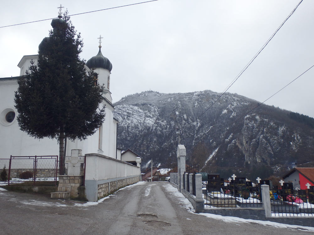 Orthodox Church and Military Cemetery in the snow