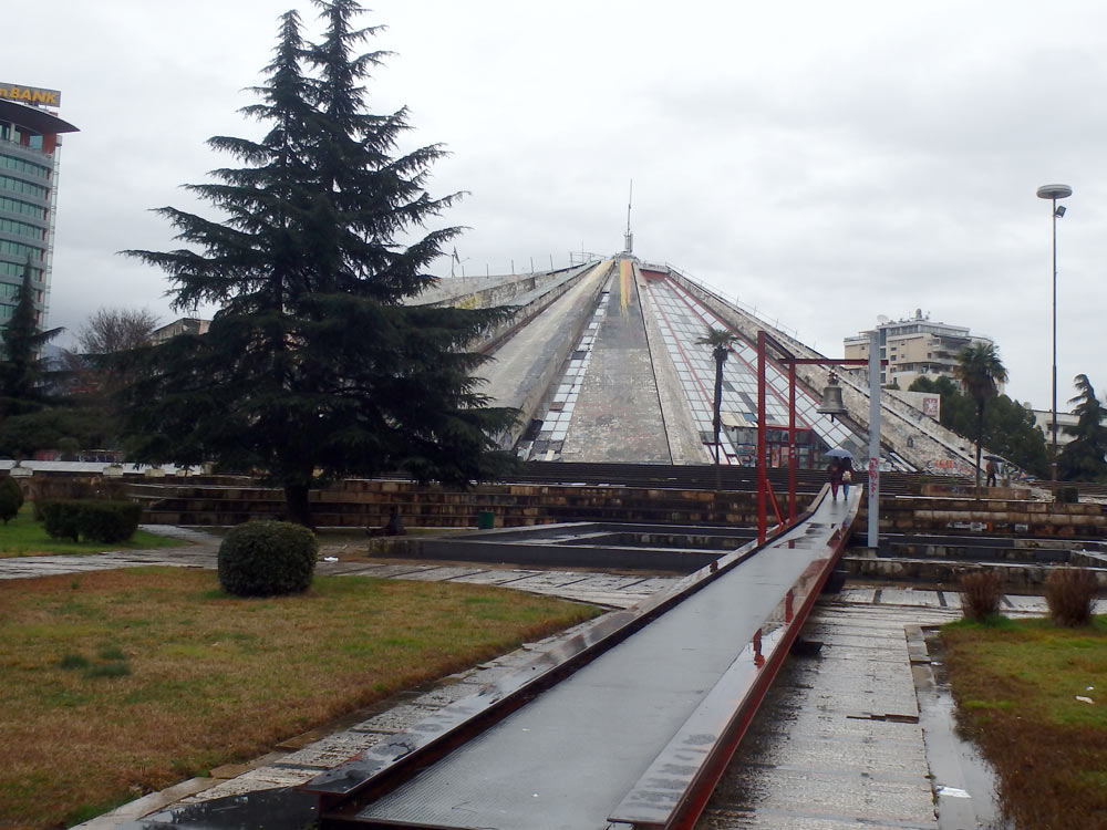 The pyramid in Tirana, with walkway and bell monument