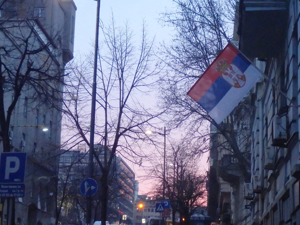 I saw the Serbian flag at sunset on a scenic street on the way home