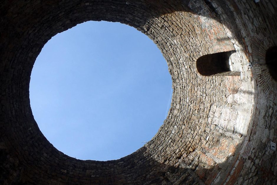 Under a round tower opening somewhere in Split.