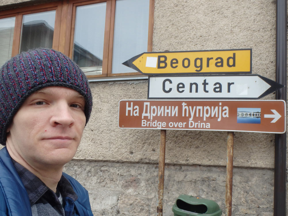 With street signs in Višegrad