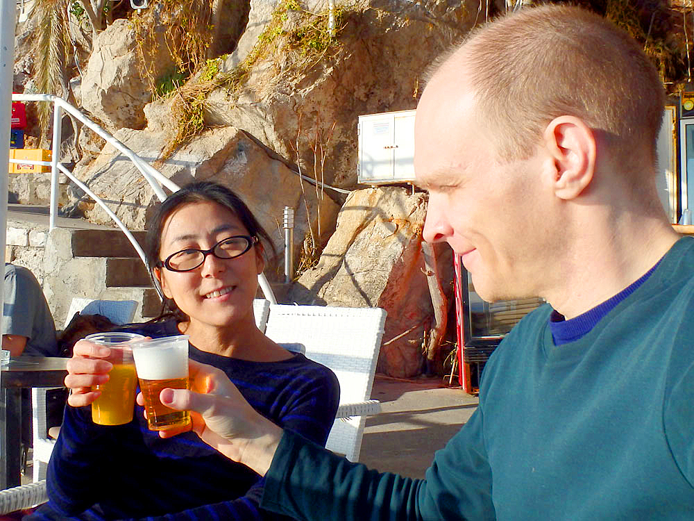 Beer and juice toast at the outdoor cliffside cafe