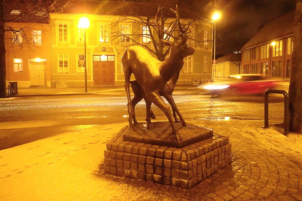 deer-statue-in-snow-at-night-trondheim