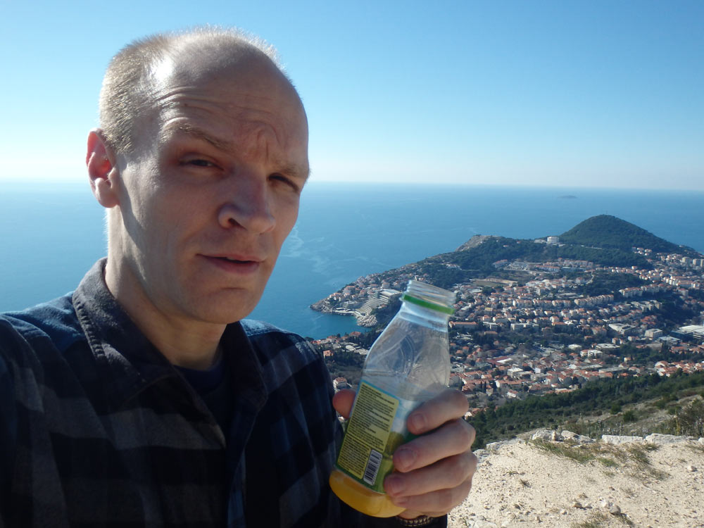 Drinking orange juice during Dubrovnik hike