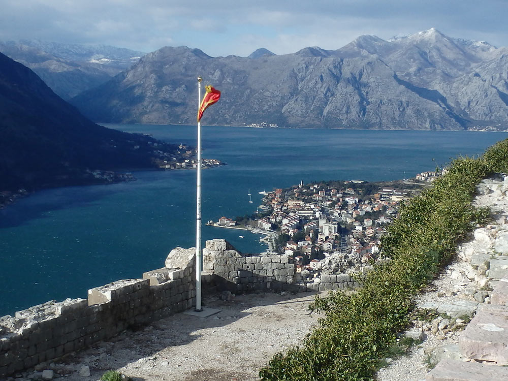 Flag and the Bay of Kotor from the hill fortress