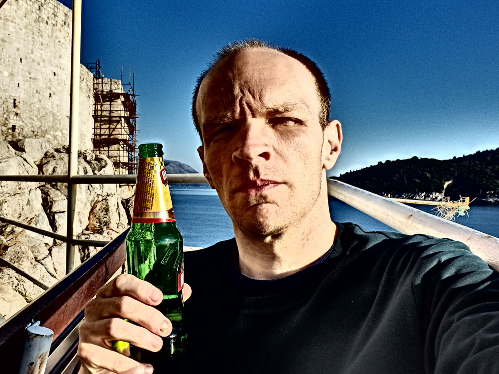 Me and beer, with "Dramatic" camera effect. That's what my camera called it, so that's the face I adopted.