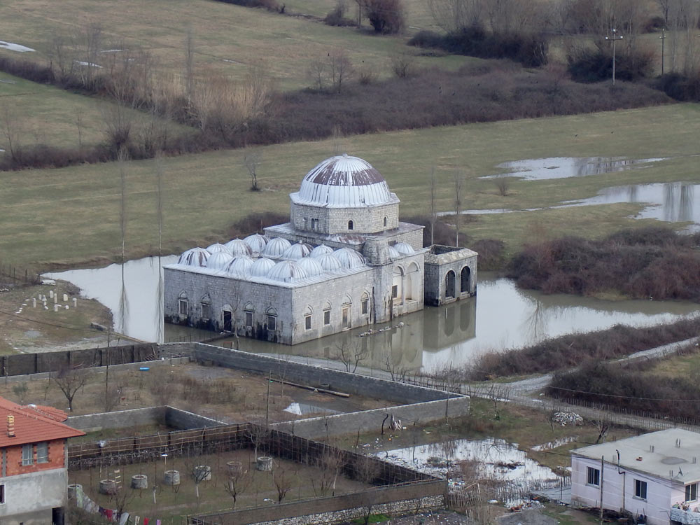 Old mosque (it looks like) in some water outside Shkodër