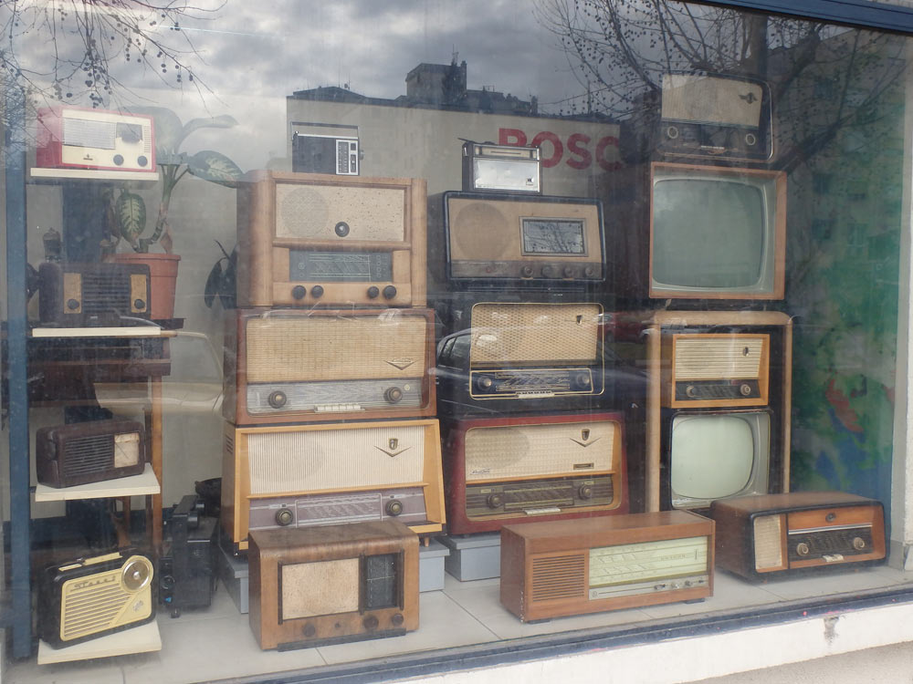 Old radios and TVs in a Podgorica shop window