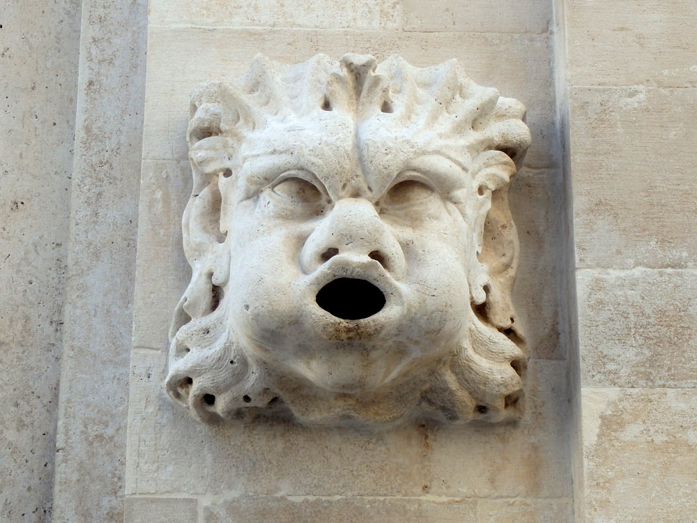 Open-mouthed face on Dubrovnik wall